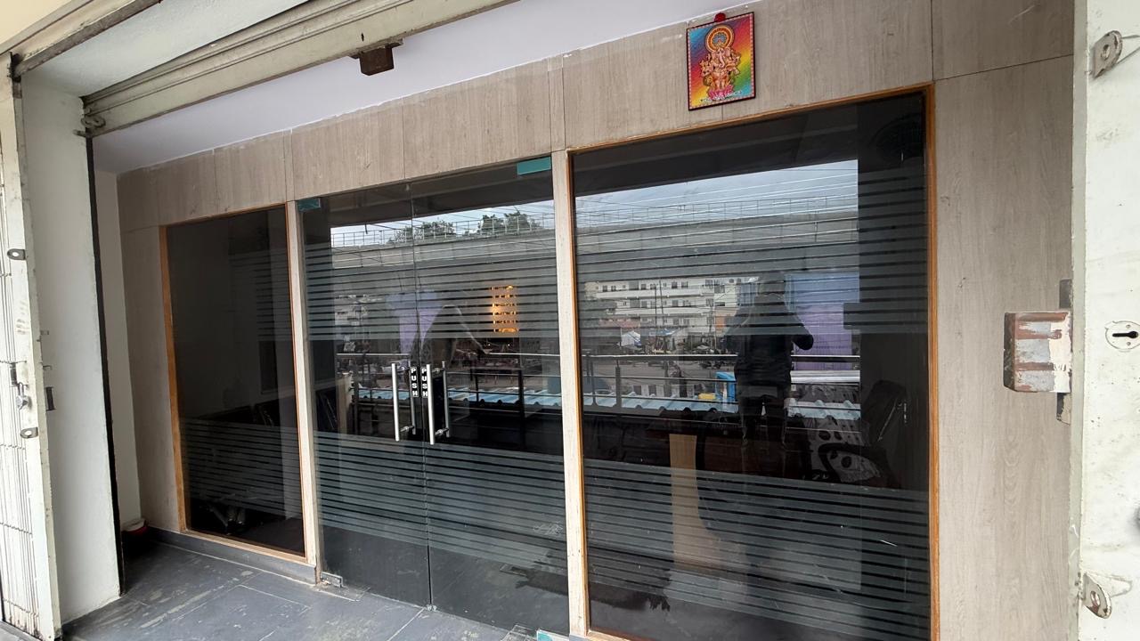 Glass entrance to the SK Business Solution office in Bengaluru